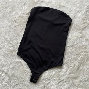 Express strapless top size XS in black. Body contour.